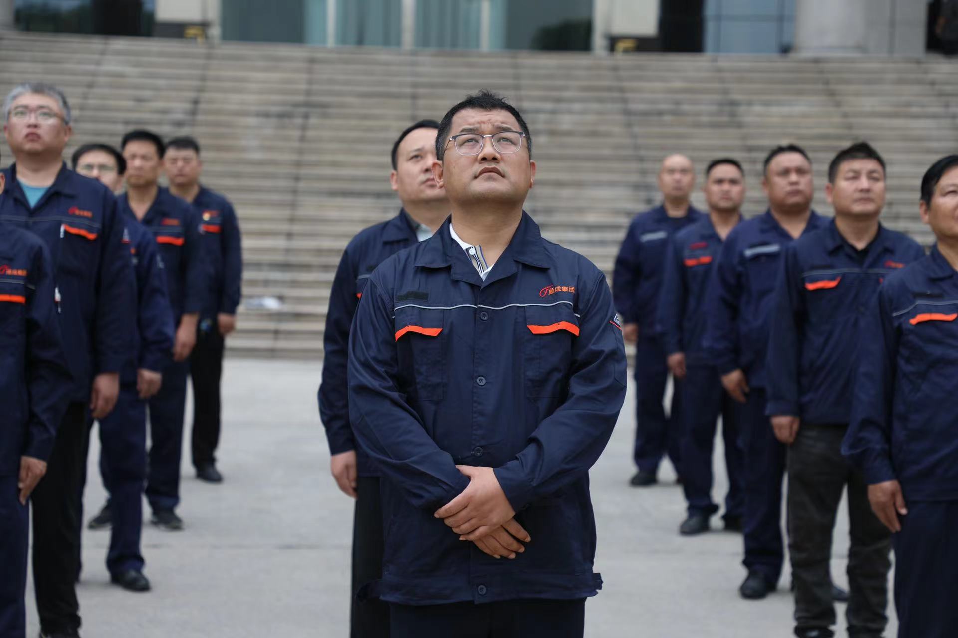 隆重举行纪念建党103周年升旗仪式